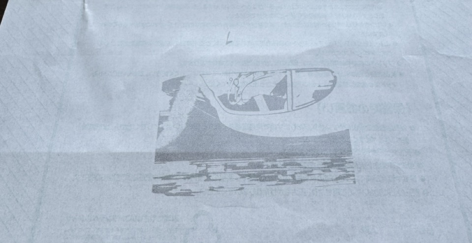 A pale grey-ish image of the car printed onto label paper.